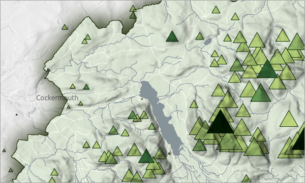 Map with basemap, hillshade, lakes, rivers, drop shadow park boundary, and green triangle symbols