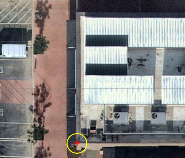 Place lower left corner of building.