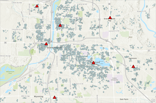 Map pane displaying Facilities features and customer features in Grand Rapids, Michigan.