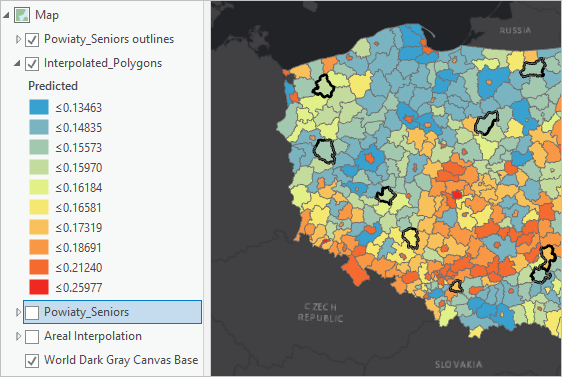 The Contents pane and map with Powiaty_Seniors outlines and Interpolated_Polygons as the only visible layers