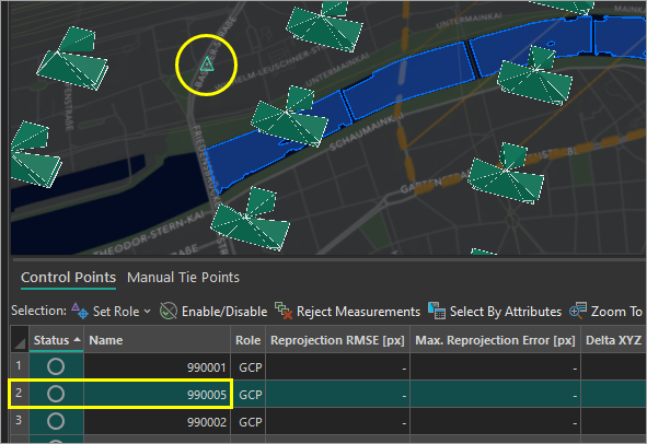 Control point 990005 selected on the globe and in the table