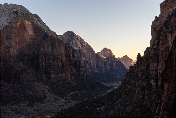 Mountain peaks and valley during daytime