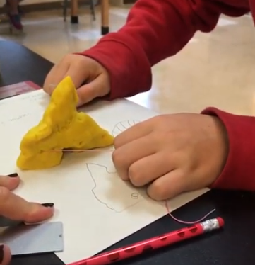 Slicing a clay mountain with string