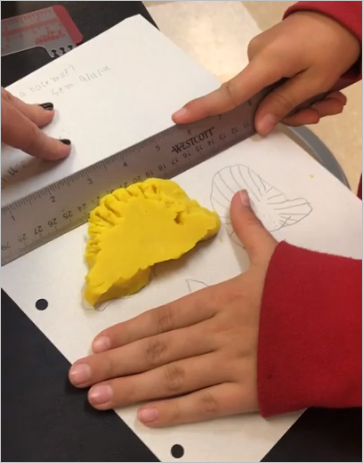 Scraping the base of the clay mountain off the paper